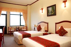 Family triple and 1 child with city view, balcony, private facilities, and breakfast